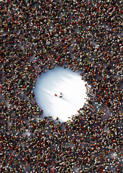 Aerial shot of a crowd with an empty spot in the middle