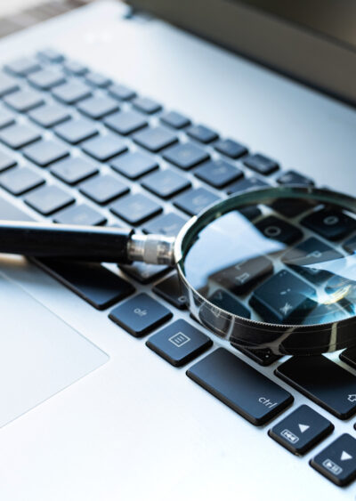 Magnify glass on a keyboard of a macbook