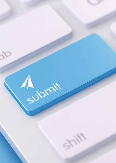 Blue submit key with send icon on it