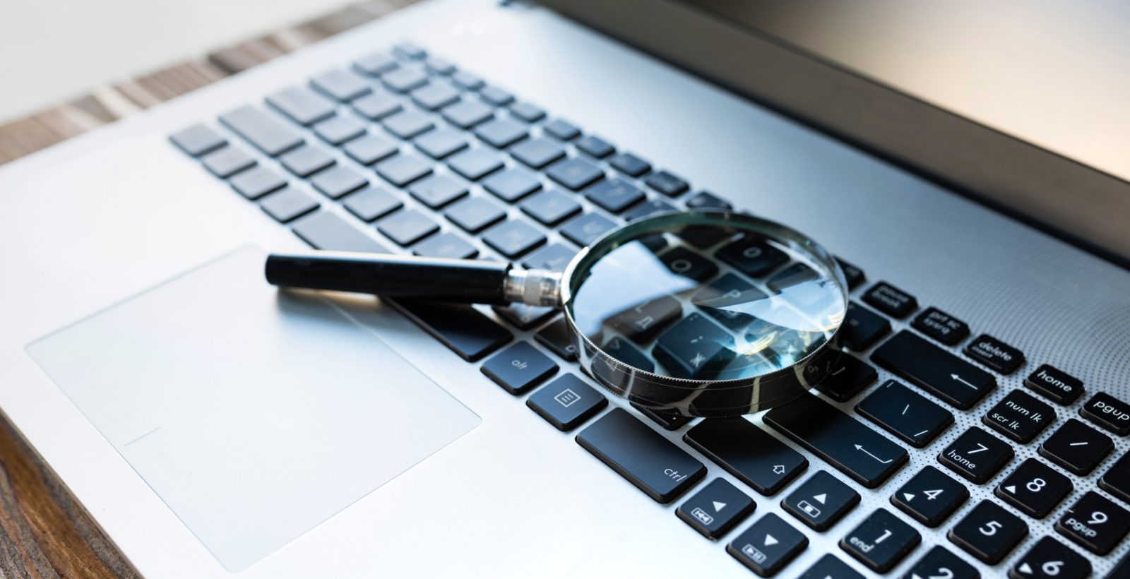 Magnify glass on a keyboard of a macbook